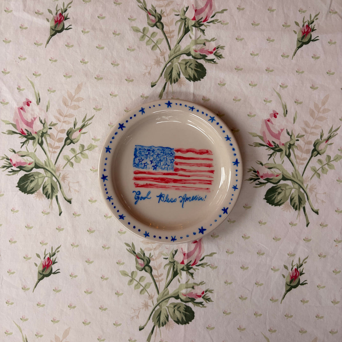 God Bless America dainty hand painted plate with American flag and delicate blue star border