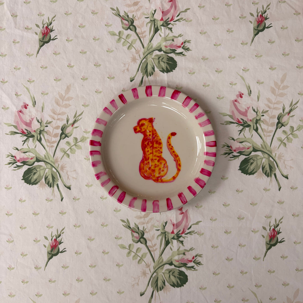 hand painted pink yellow cheetah illustration hand painted on ivory plate